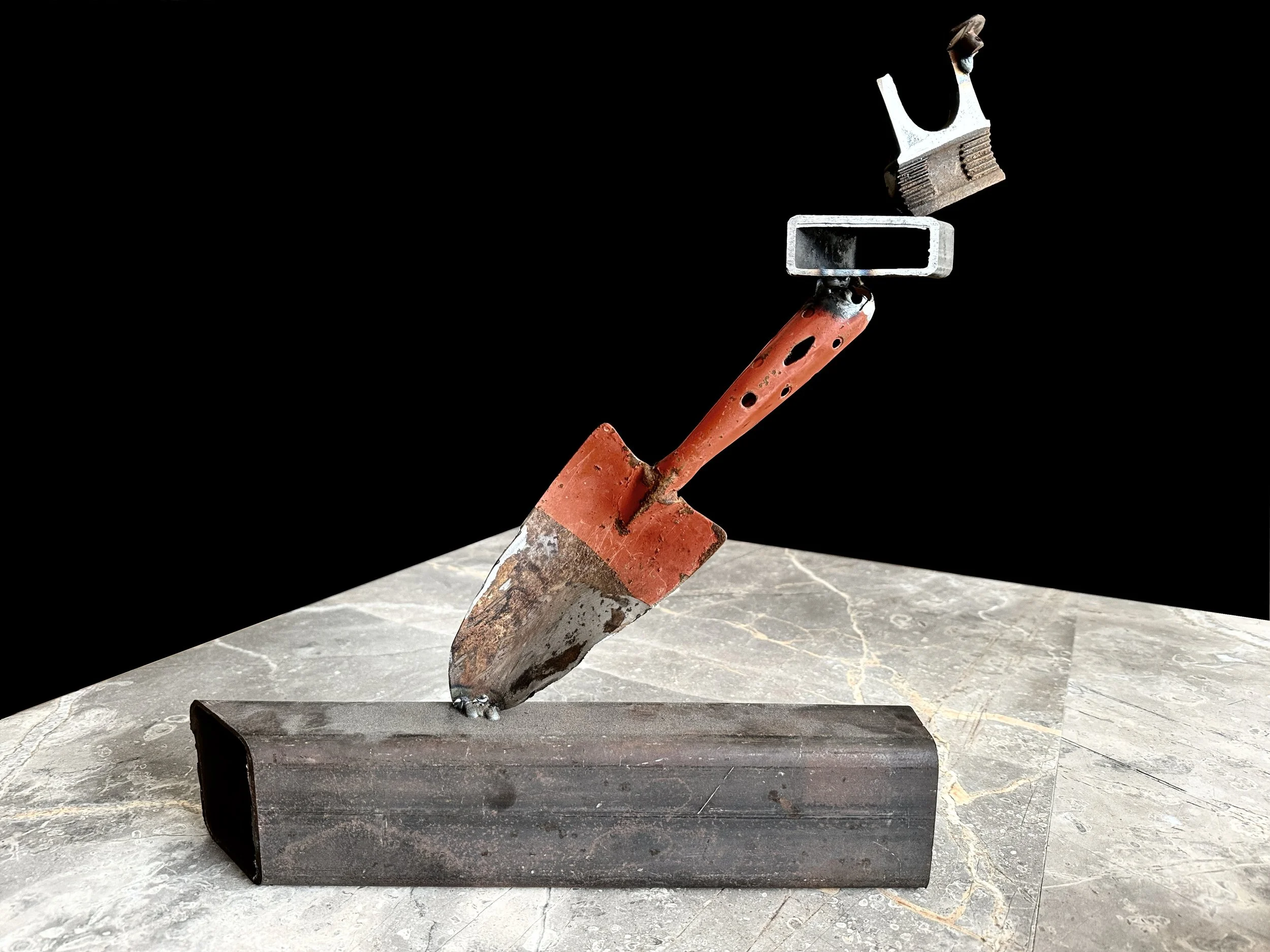 Unity Scrap steel sculpture with Dad’s trowel by Julie Eisenberg Pitman