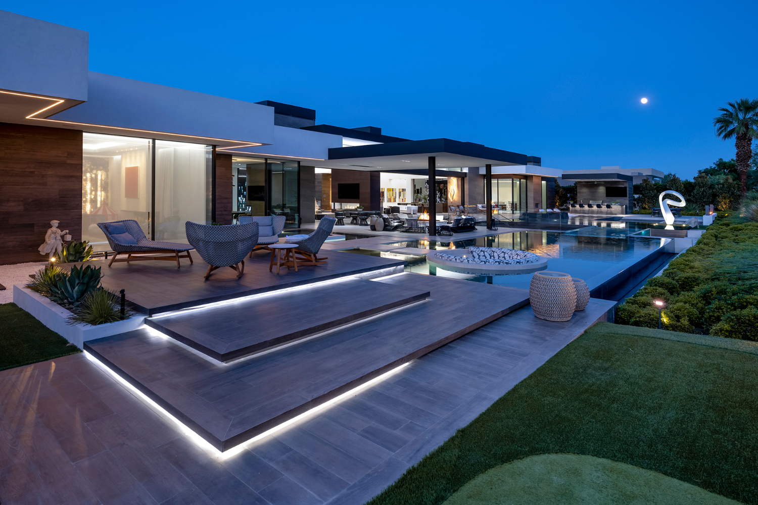 Serenity modern desert mansion in Indian Wells, with backyard pool terrace with resort style living areas