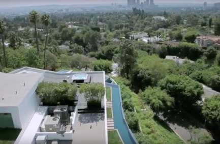 Laurel Way Beverly Hills modern mansion with wraparound moat pool and rooftop HVAC