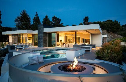 Trousdale Beverly Hills modern home backyard pool terrace with built in fire pit