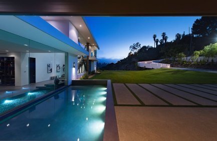 Benedict Canyon Beverly Hills modern luxury home with indoor outdoor entry pond