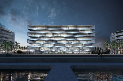 The Honeycomb modern apartment building at night in the Bahamas, designed by modern architect Bjarke Ingels, provides each unit with a private balcony pool