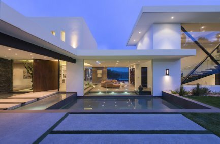 Modern geometric and glass walled exterior design of Benedict Canyon Beverly Hills luxury home