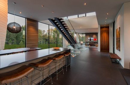 Breakfast bar and interior design of modern open plan home in Great Falls, Virginia