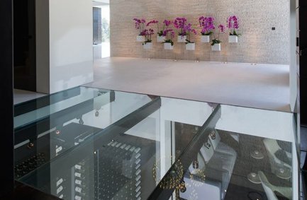 Laurel Way Beverly Hills luxury modern home glass floor walkway and natural light