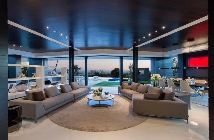 Laurel Way modern Beverly Hills mansion glass wall living room