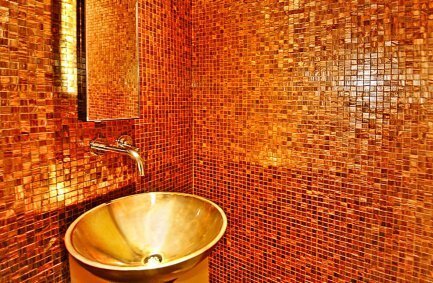 Bronze, gold, copper and orange tiled custom bathroom powder room design at our modern 9288 Sierra Mar house in the Hollywood Hills