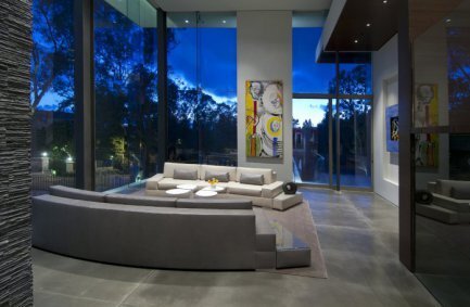 Modern 20 foot energy efficient glass walls in the living room of our Summit House in Beverly Hills
