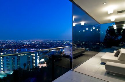 Ultra modern Hollywood Hills hilltop home with glass wall city views