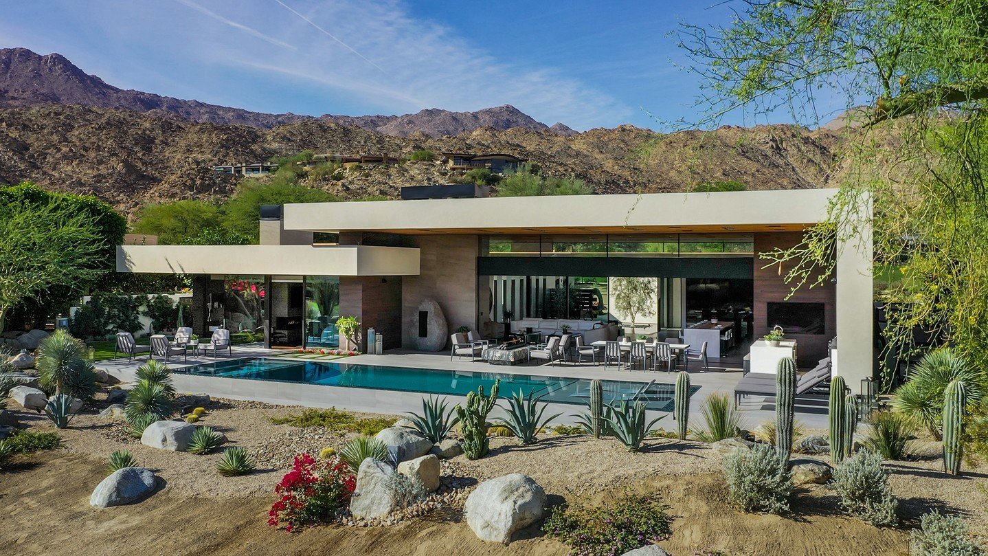 Bighorn opens its indoor outdoor design to a luxury backyard pool terrace with desert landscaping and views. Photo by @maccollum, landscape architecture by @attingerlandscapearchitecture, and pool by @azurepoolsandspas