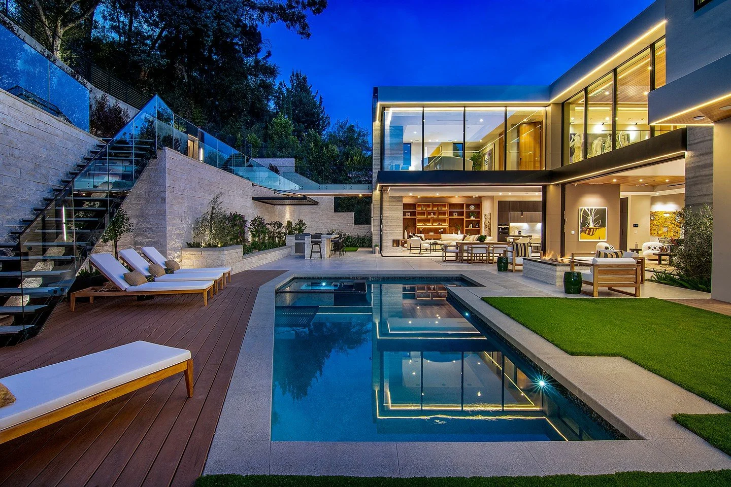 Hutton Drive 2641 in Beverly Hills, a custom indoor outdoor modern home with sliding glass walls that open to a backyard pool terrace with upper level sun deck. Photo by Adam Latham.