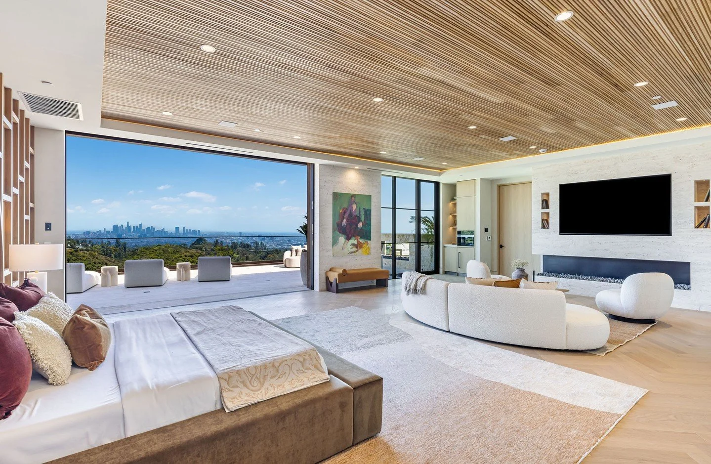 The luxury primary bedroom with private terrace and views at our 1414 Donhill Drive house in Beverly Hills. Photo by @berlynmedia