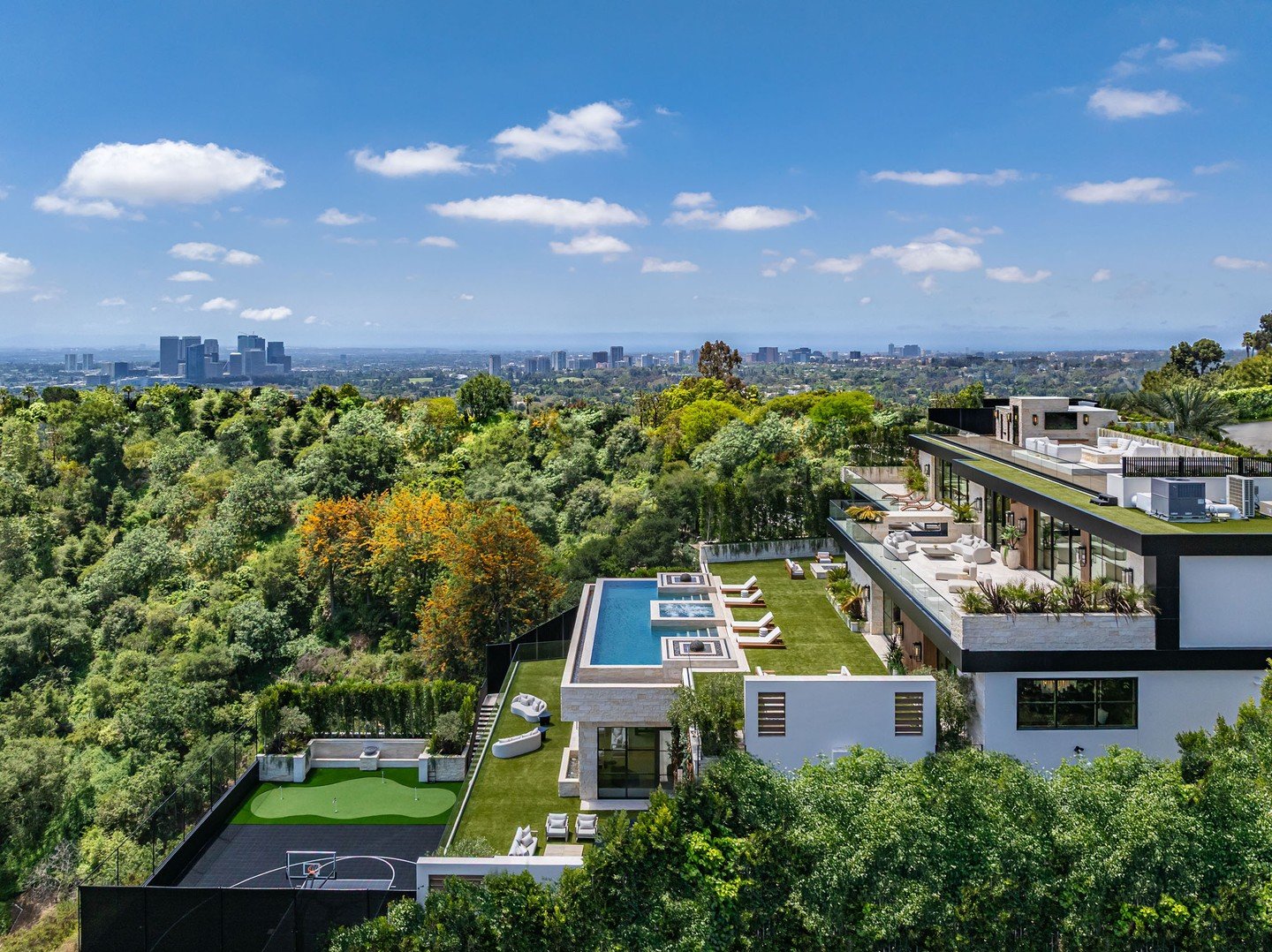 The modern terraced design of our Beverly Crest house in Beverly Hills, which opens every level to an outdoor deck for sports, relaxation, and resort style living. Photo by @berlynmedia