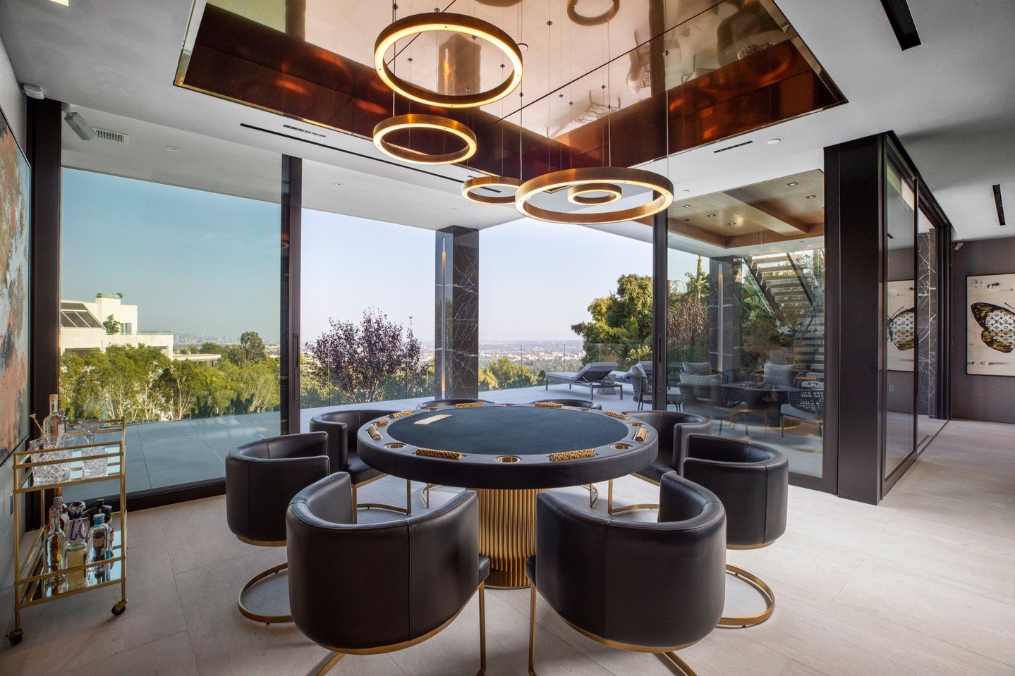 Jetliner views from the luxury game room at our Summitridge Drive house in Beverly Hills. Photo by @mrbarcelo.
