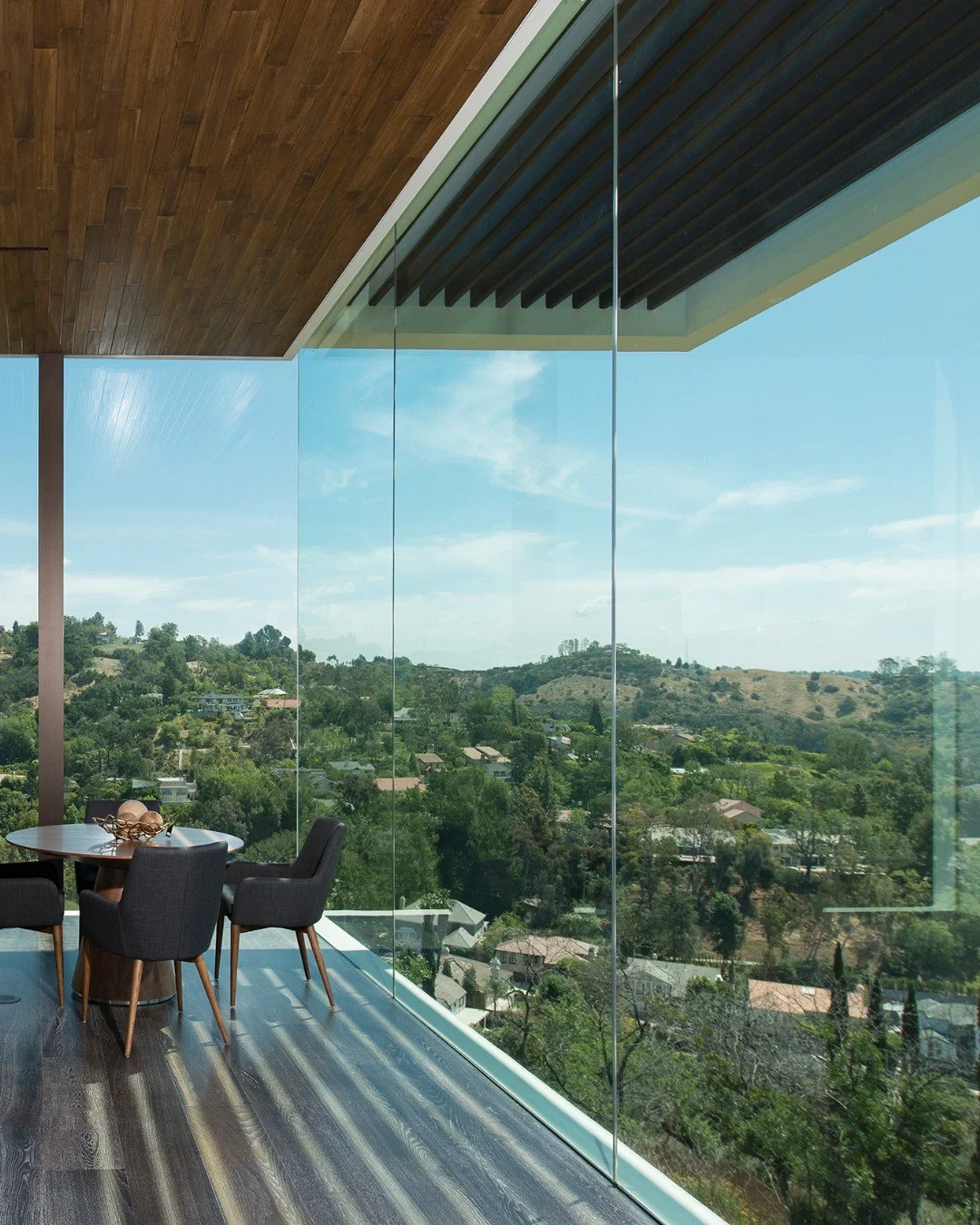 Wraparound sweeping views through floor to ceiling glass, at our Benedict Canyon 2016 house in Beverly Hills. Photo by @maccollum