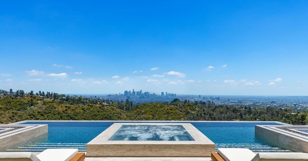 The modern pool terrace with infinity edge views at our Beverly Crest house in Beverly Hills. Photo by @berlynmedia