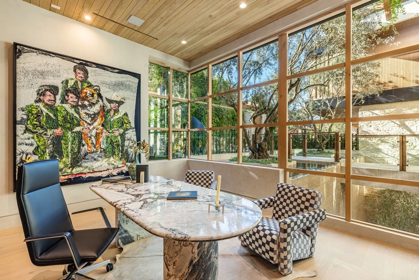An eclectic mix of modern furniture and natural elements create a luxury home office at our Beverly Crest house in Beverly Hills. Photo by @mrbarcelo