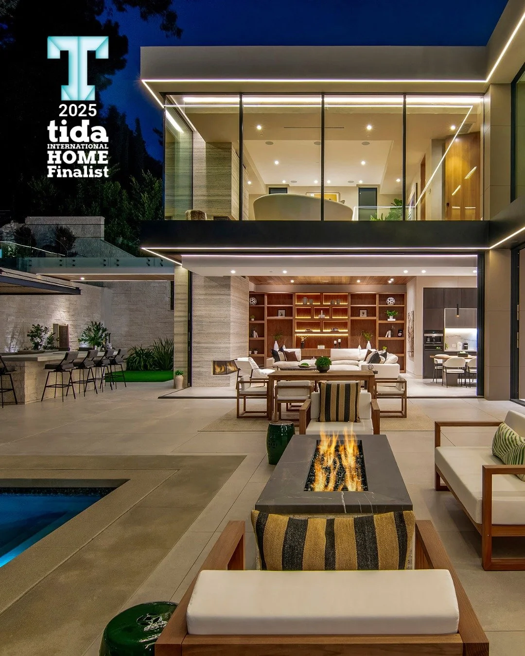 Hutton Drive 2641, a modern Beverly Hills home with luxury design that seamlessly opens onto a comfortable outdoor pool terrace. Finalist in @trendsideas Design Awards 2025 International Home of the Year! Photo by Adam Latham.
