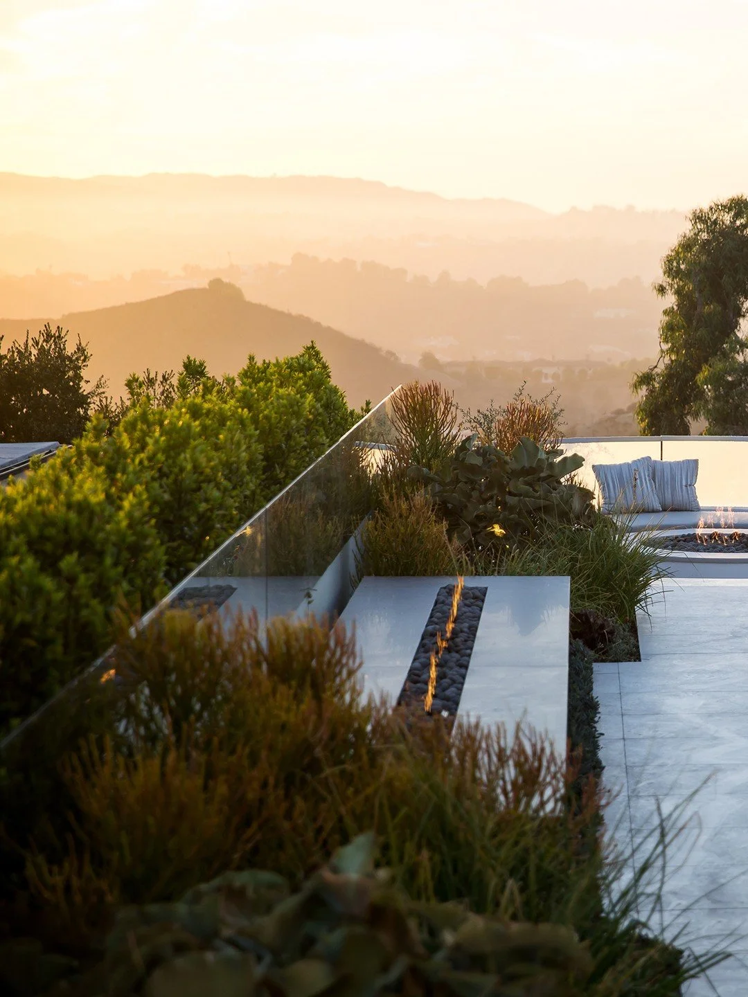 Modern outdoor living with views, at our Trousdale house in Beverly Hills. Photo by @jasonspethphoto