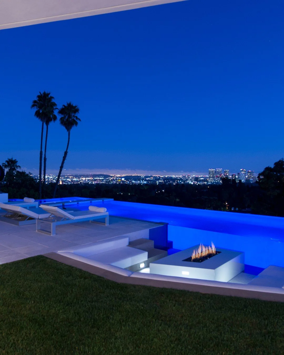 Sweeping LA views from the modern pool terrace at our Laurel Way house in Beverly Hills. Photo by @maccollum