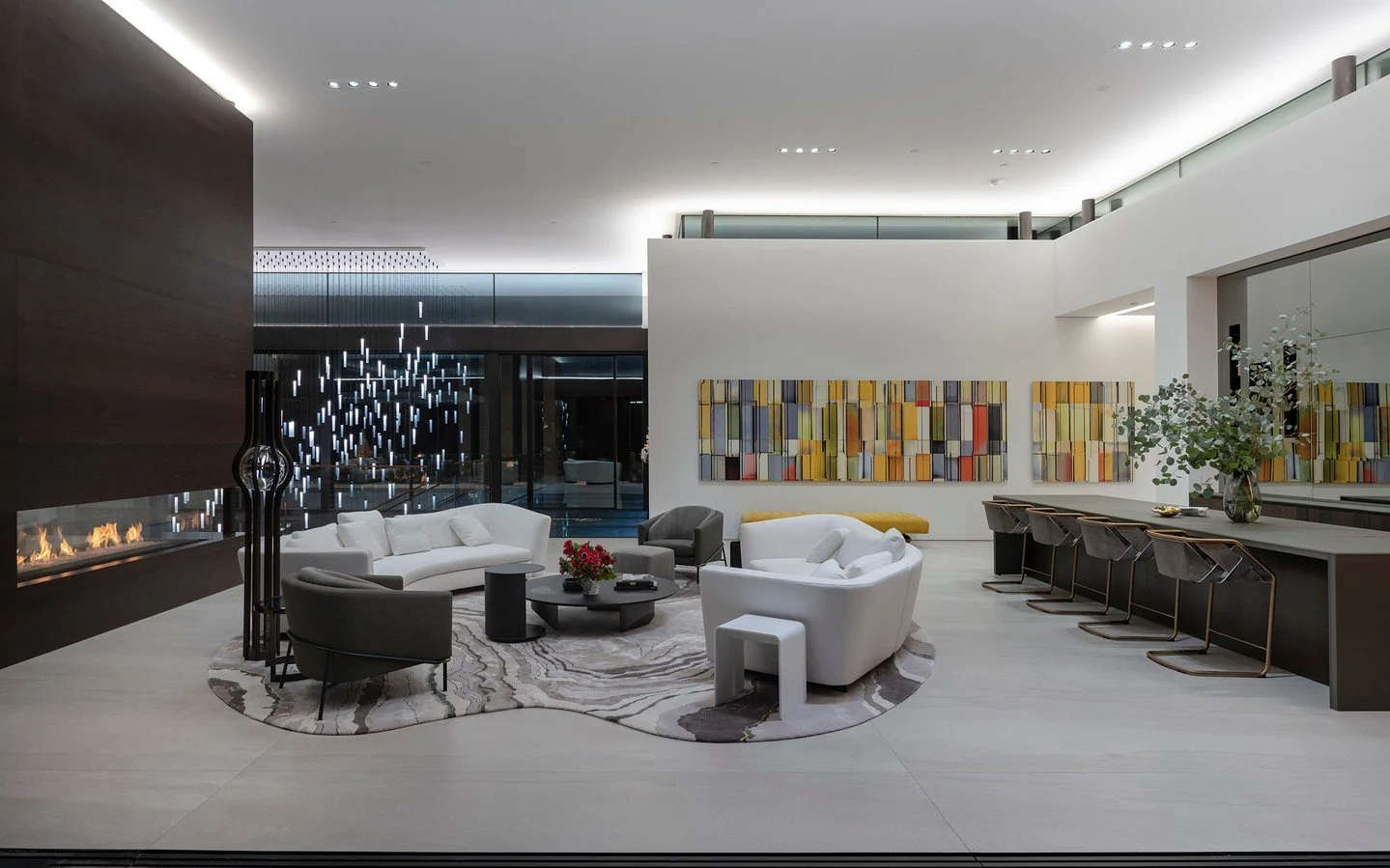 The sleek, modern interior of our Serenity house in Indian Wells, with custom artworks, indirect LED lighting, and open floor plan. Photos by @maccollum