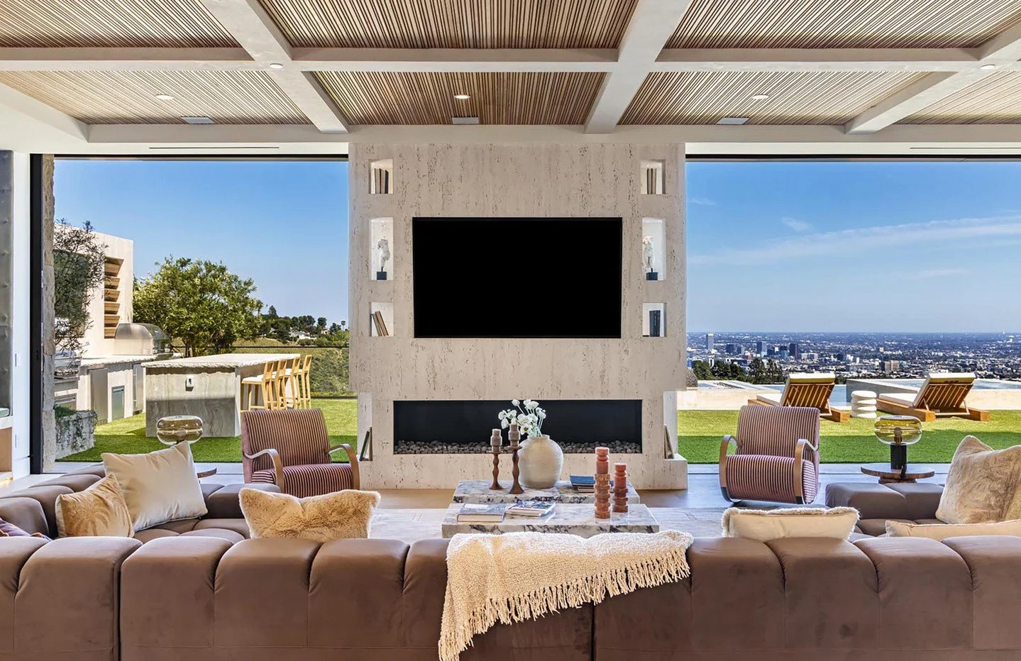 Modern indoor outdoor living rooms at our luxury resort style custom homes. Photos by @berlynmedia, @jasonspethphoto, @maccollum, and @mrbarcelo.