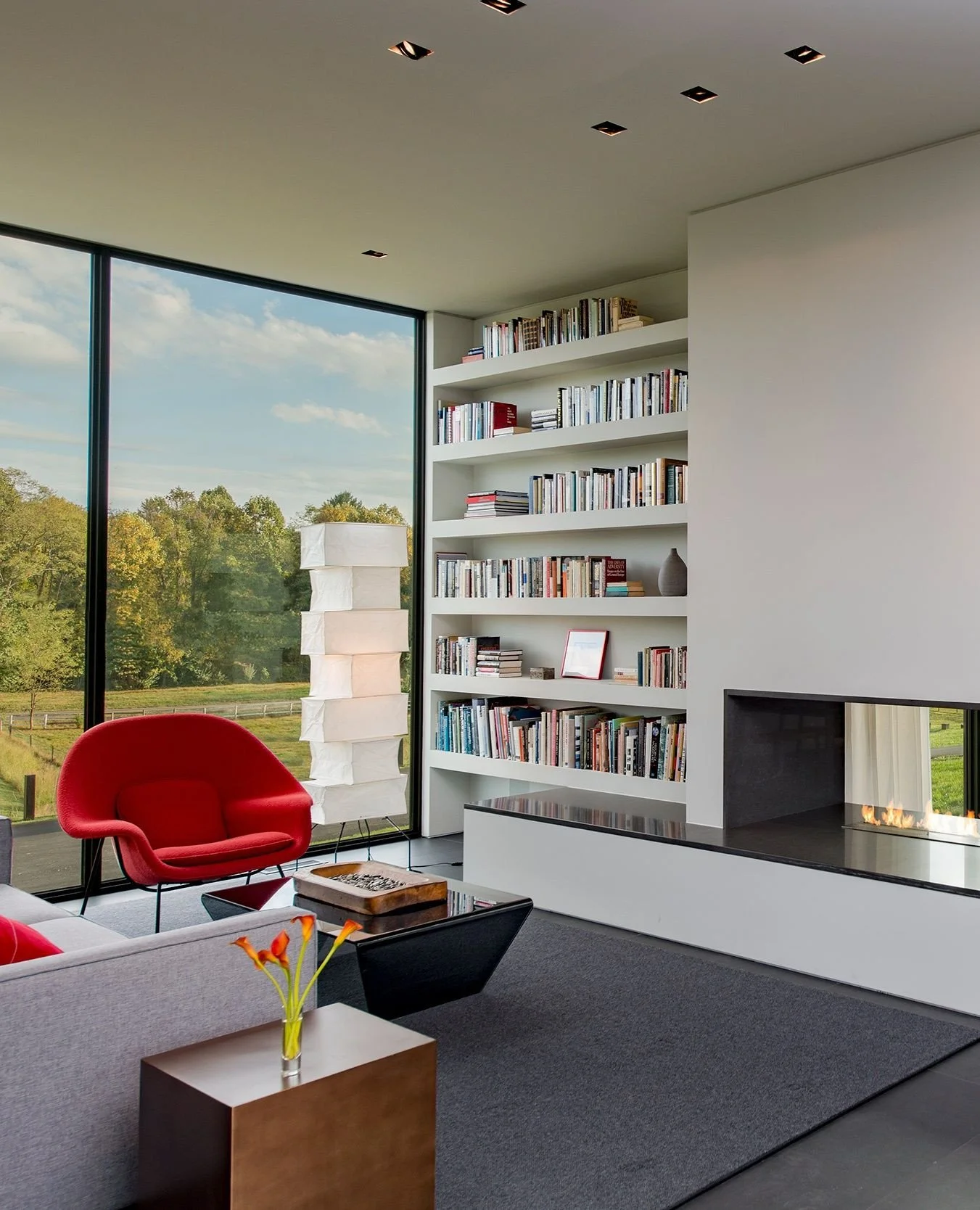 The bright modern reading room with views at our Walker Road house in Great Falls, Virginia. Photo by @maccollum
