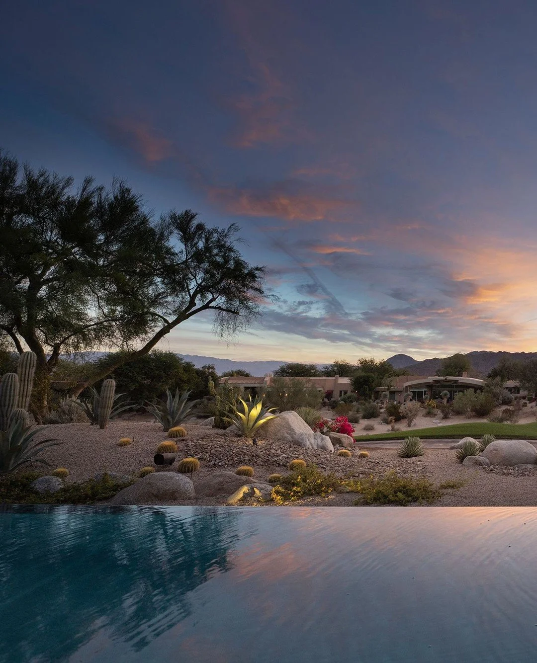 The luxury infinity pool at our Bighorn house in Palm Desert, California, with sleek out-to-the-edge design, and sunset views. Photo by @maccollum