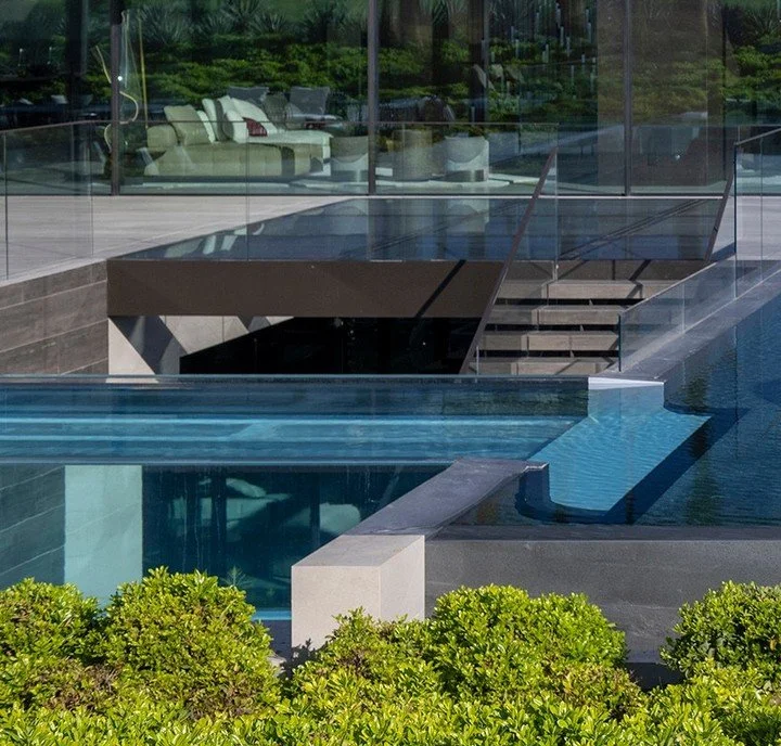 Serenity, a luxury desert home with modern indoor outdoor design, and resort style swimming pool. Photo by @maccollum