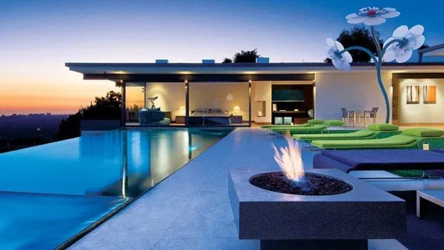 Hopen Place, a luxury mid-century modern style custom home in the Hollywood Hills. Photo by @maccollum, via the @hollywoodreporter