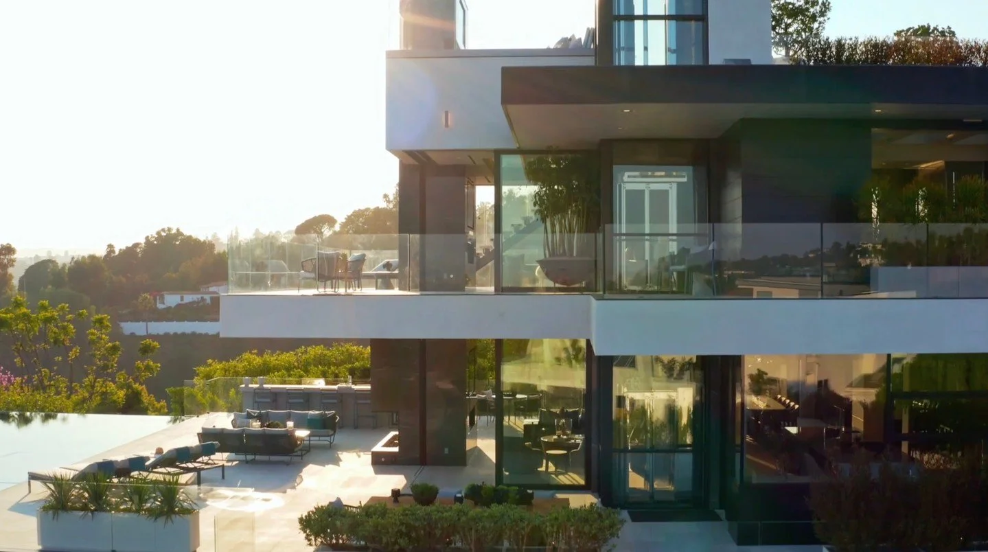 The modern indoor outdoor luxury design of our Summitridge Drive house in Beverly Hills. Video still from @mrbarcelo