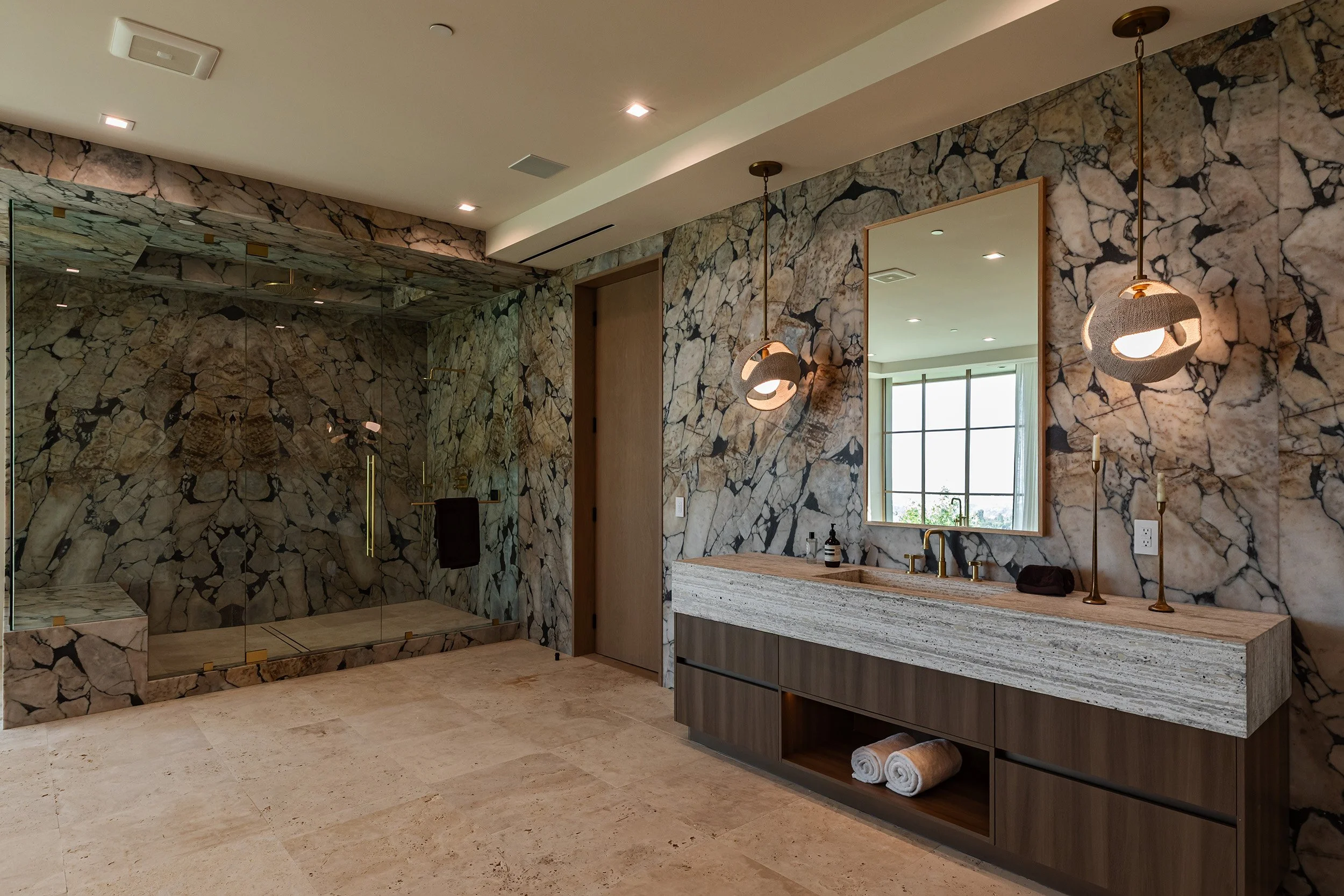 Franklin Canyon Beverly Hills luxury home modern primary bathroom with marble wall details