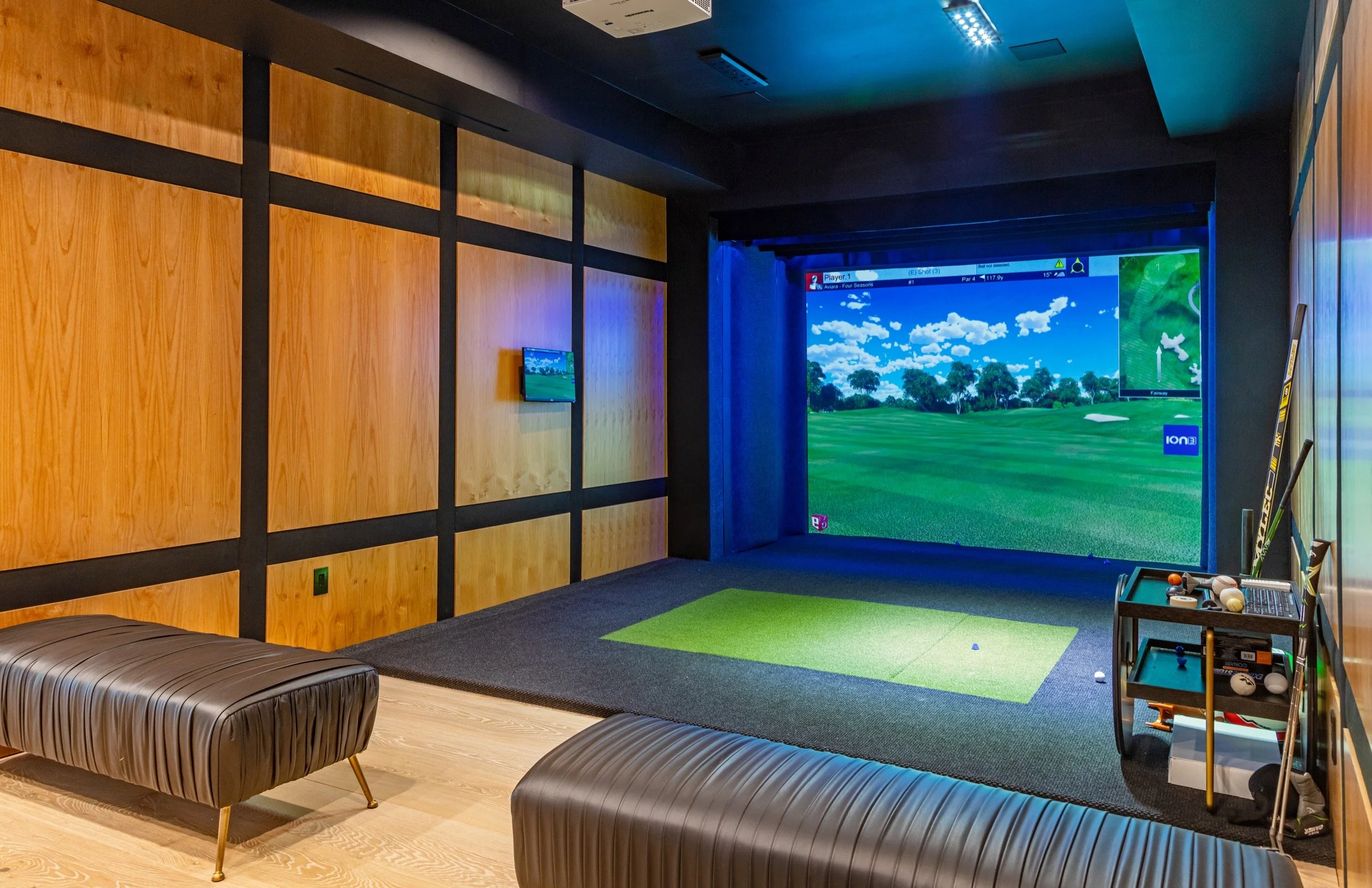Luxury sports simulator at Bundy Drive, a modern home in Brentwood, Los Angeles