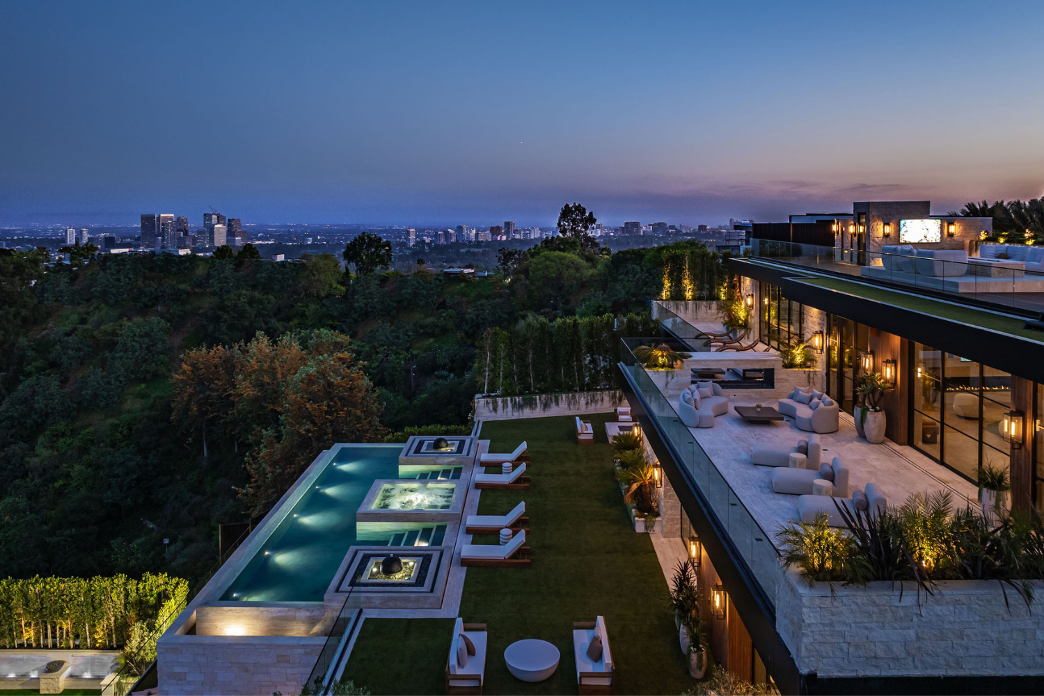 Beverly Crest modern Beverly Hills estate with terraced design, resort style outdoor patios, and infinity pool