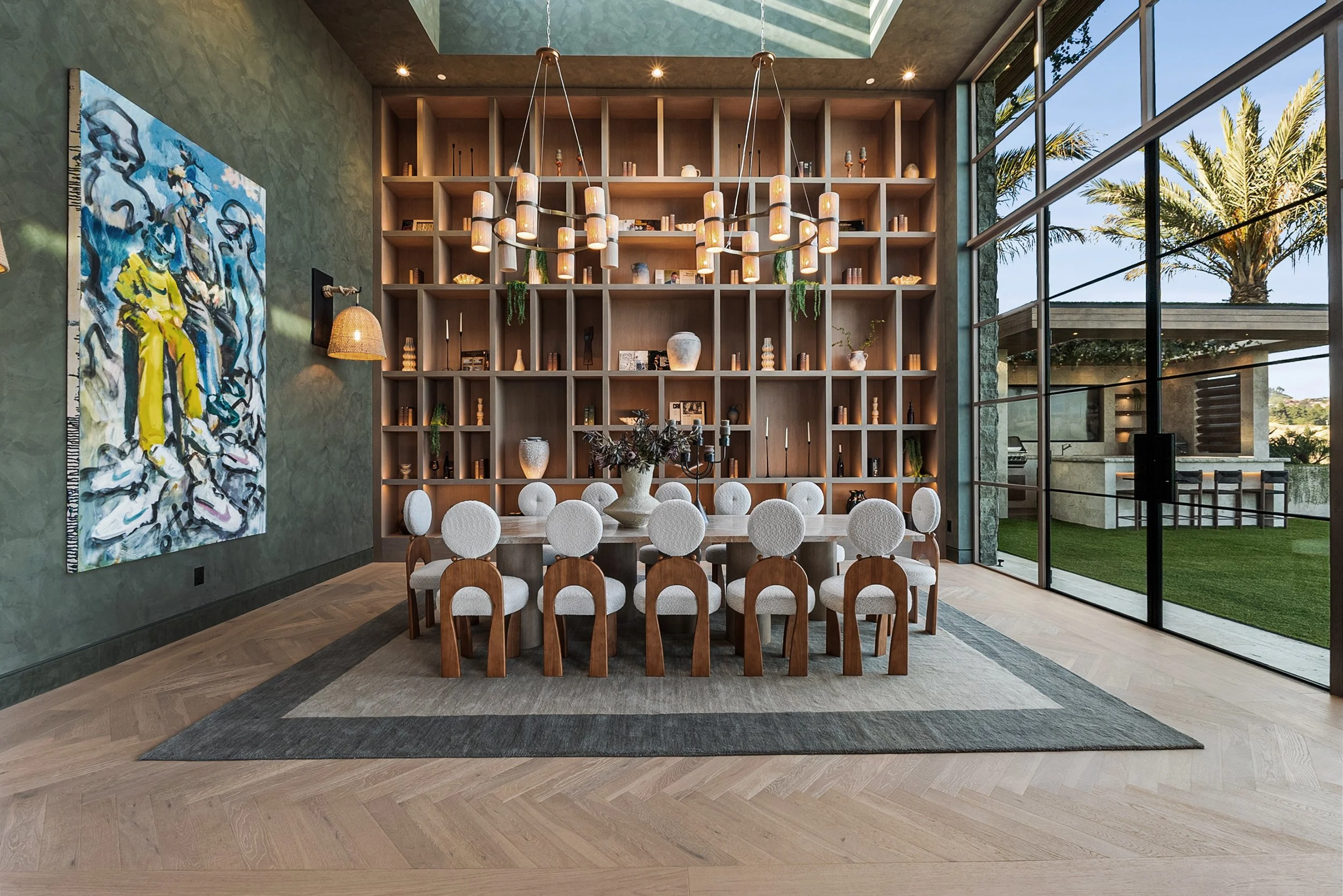 Laurel House Beverly Hills luxury home modern light filled dining room with built-in display cabinets and custom artworks