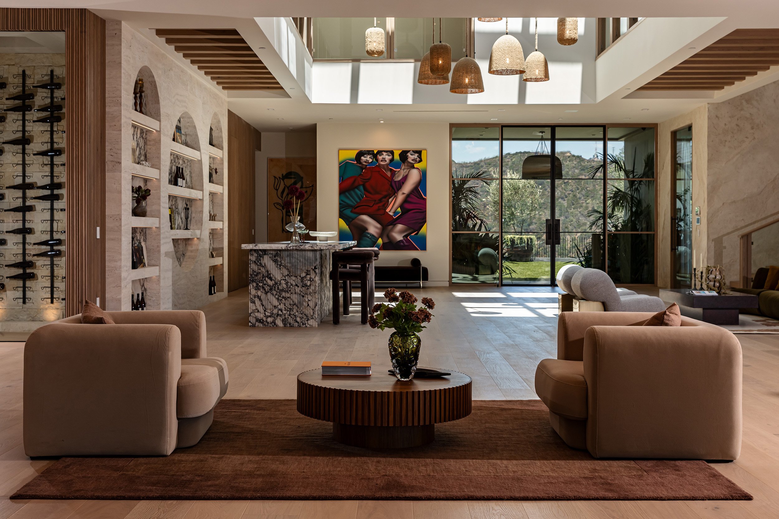 Franklin Canyon Beverly Hills luxury home with modern open plan interior & light filled living room bar