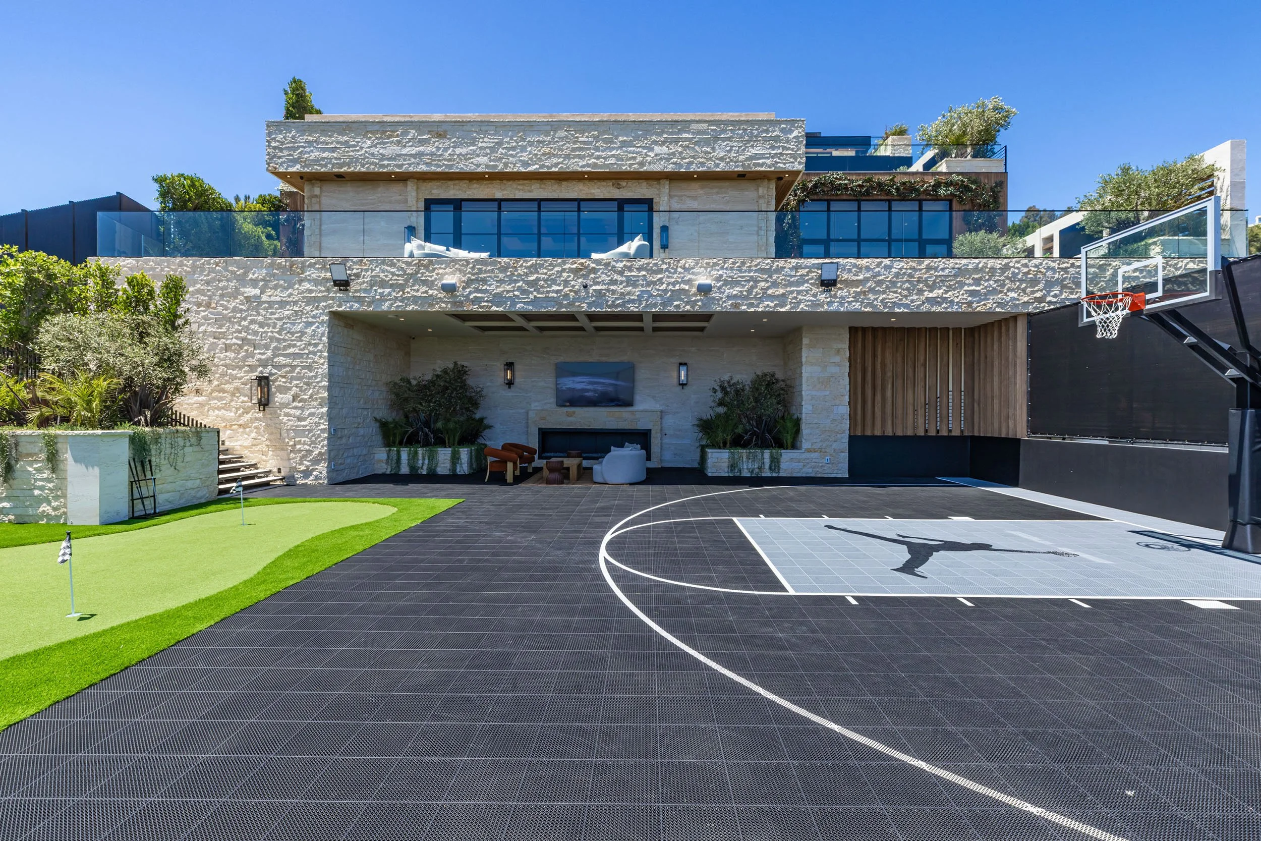 Custom basketball court and putting green at Beverly Crest luxury modern home in Beverly Hills