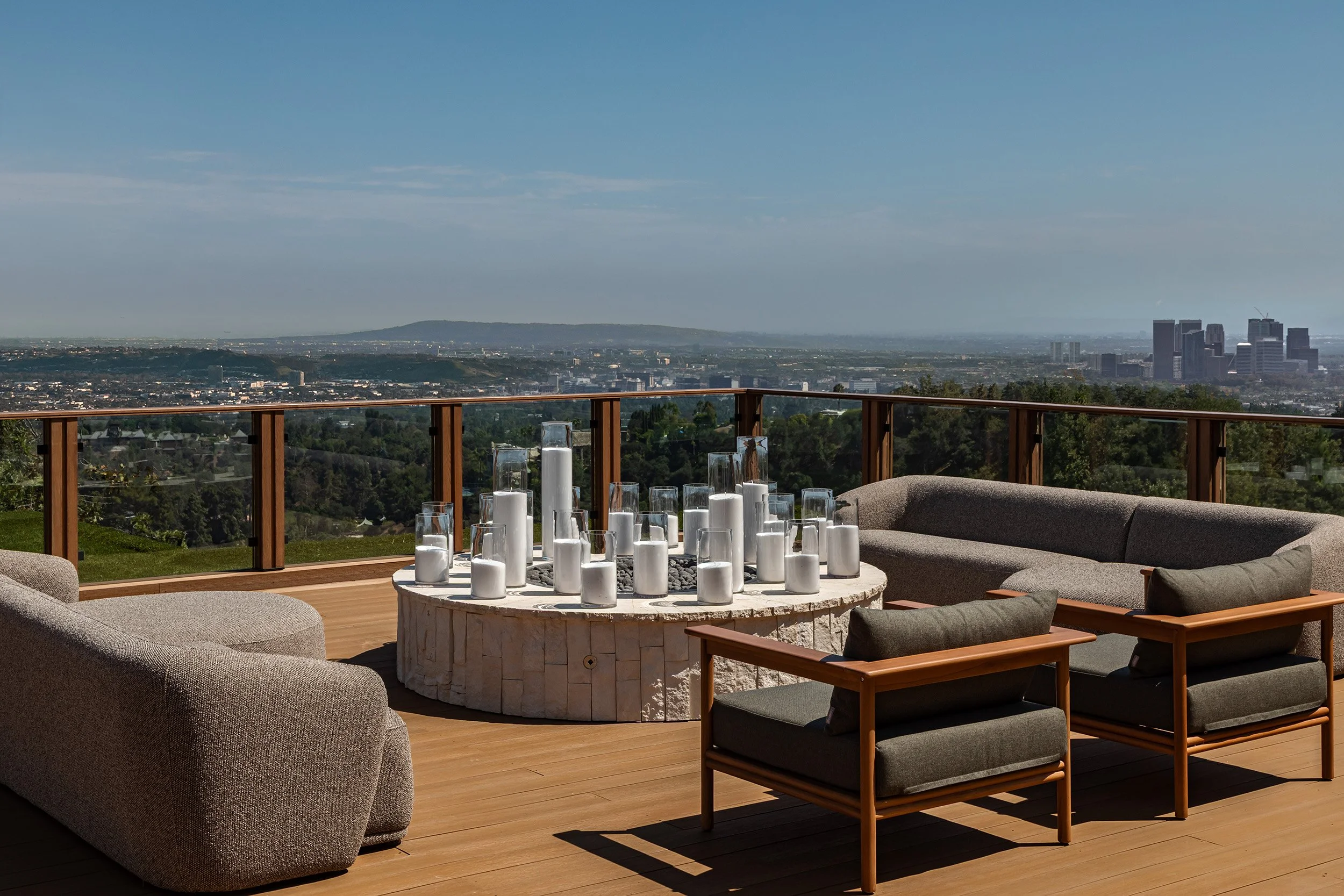 Franklin Canyon Beverly Hills luxury home modern rooftop terrace with fire pit & sweeping LA city views