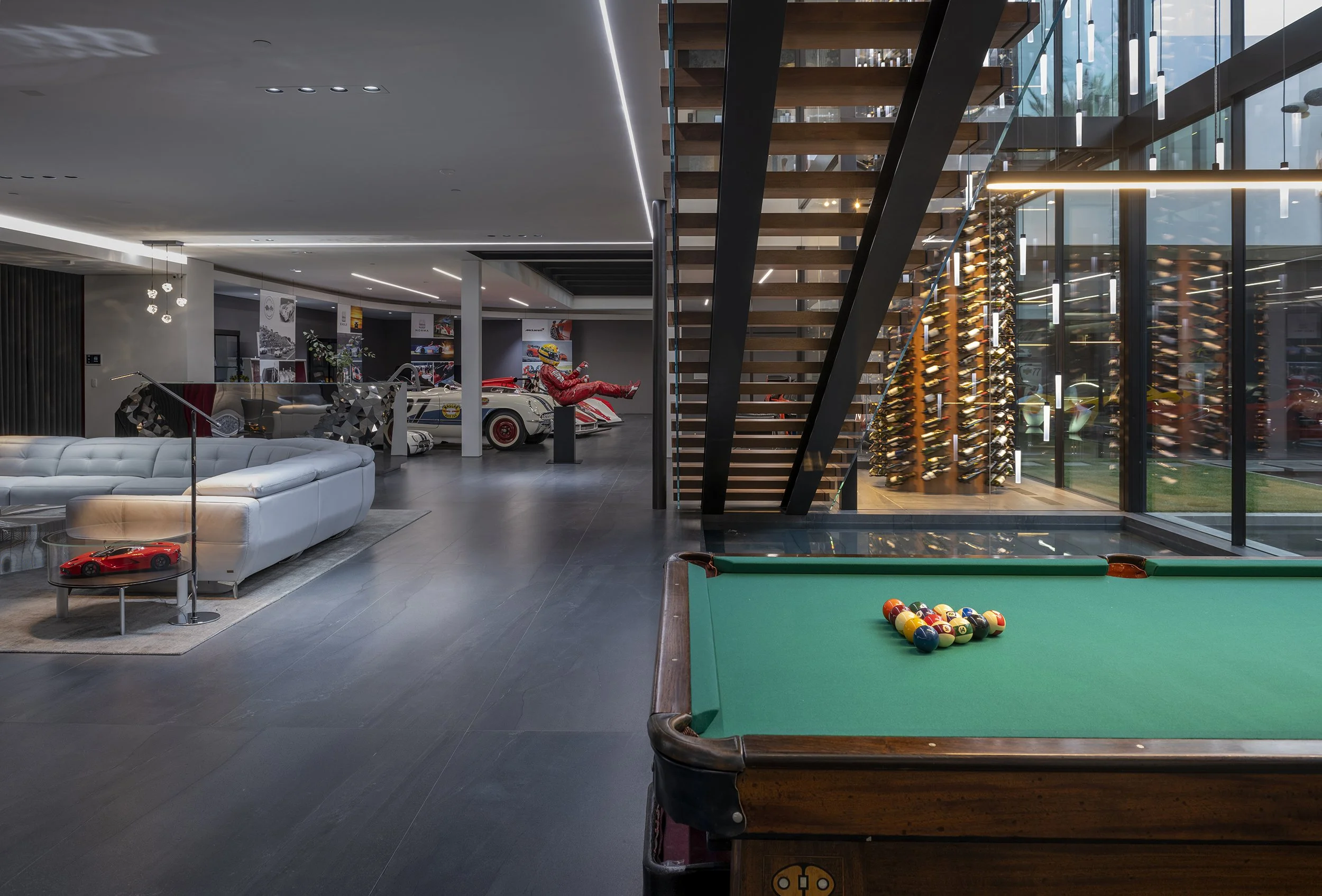 92-Serenity-Indian-Wells-modern-mansion-entertainment-lounge-luxury-car-display.jpg