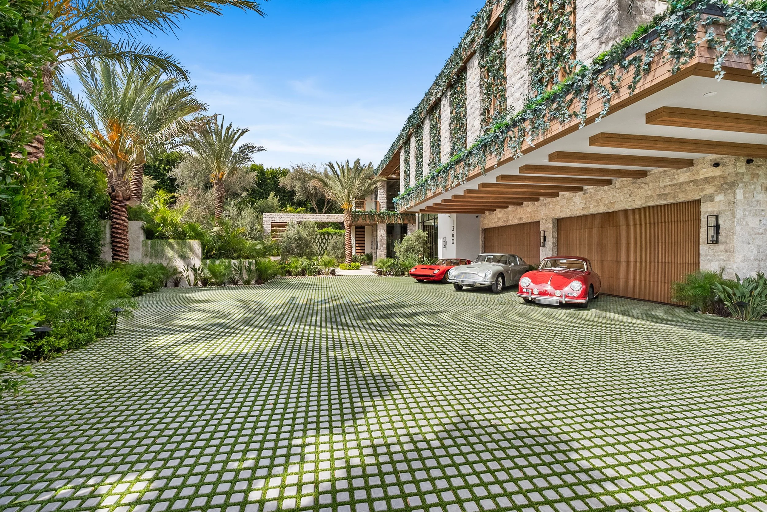 Laurel House Beverly Hills modern luxury home with richly textured details and lush landscaping