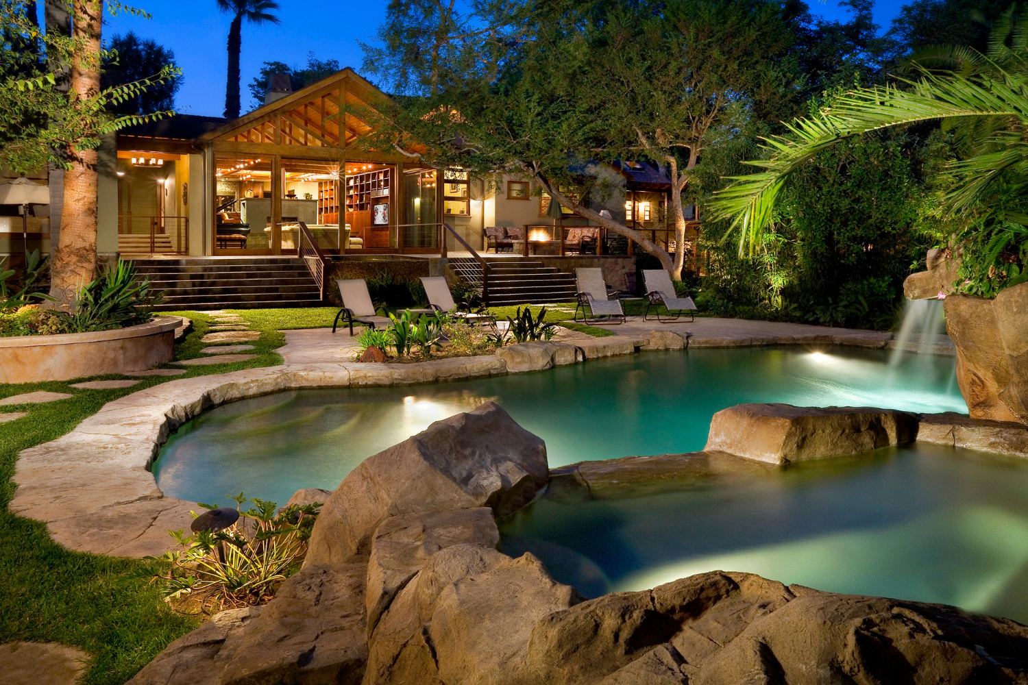 Farmdale Avenue modern ranch style home in North Hollywood, with rock lined swimming pool & waterfall