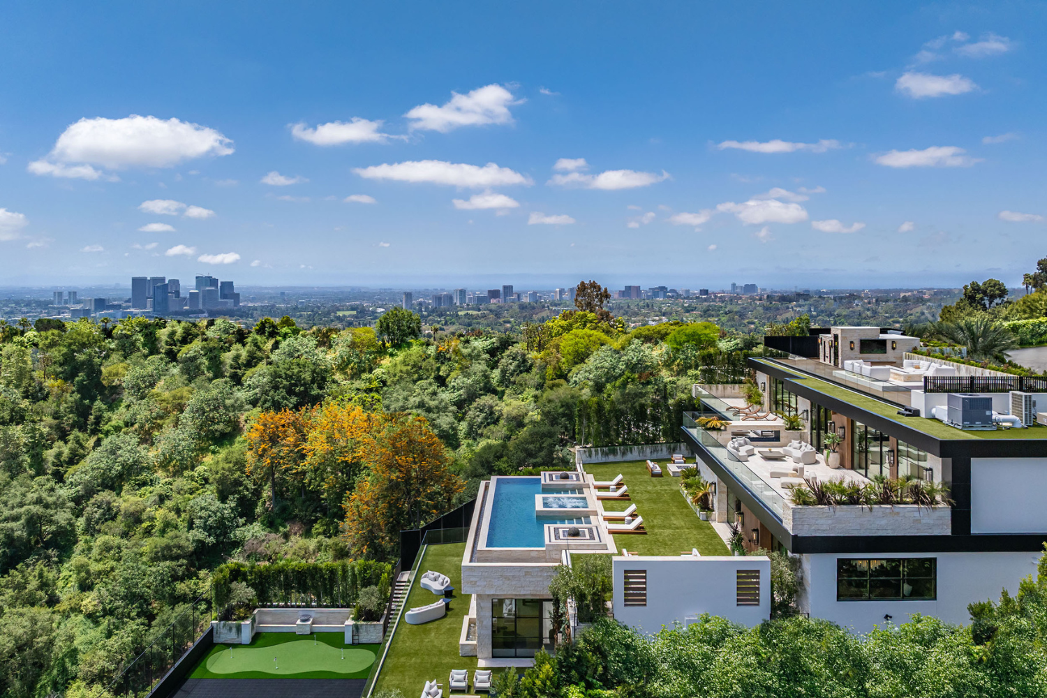 Beverly Crest luxury Beverly Hills mansion with terraced hillside design & resort style swimming pool