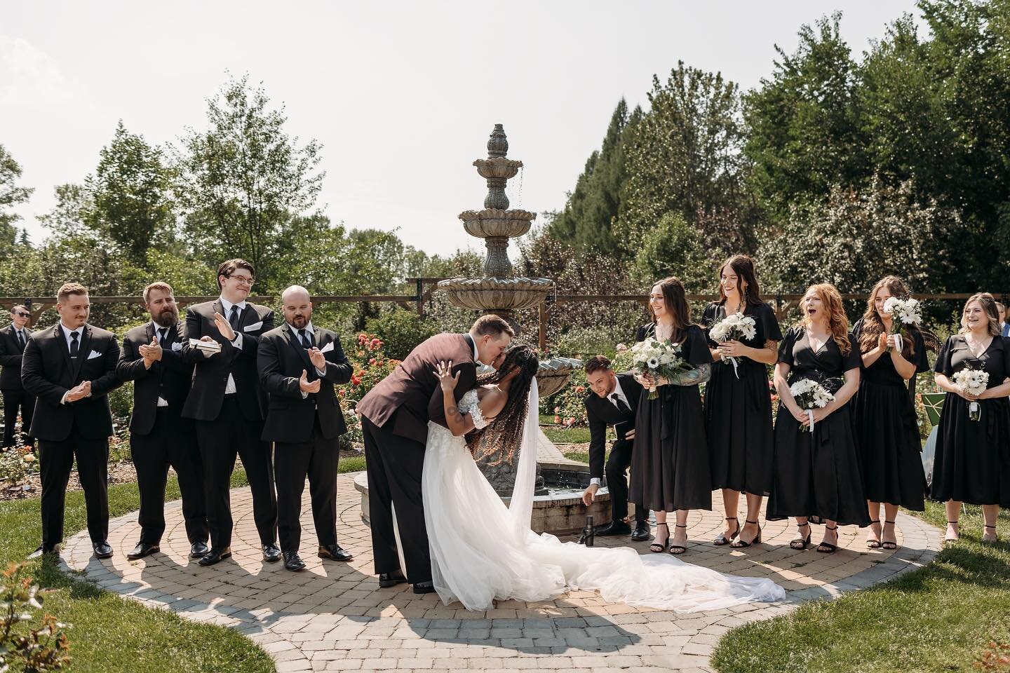 Some beautiful moments from this beautiful wedding ceremony at the St. Albert Botanic Park 💐 ⁣
⁣
This wedding venue was one of my favourites from last year! Shooting through the flowers, listening to the trickle of the fountain, while capturing a wi