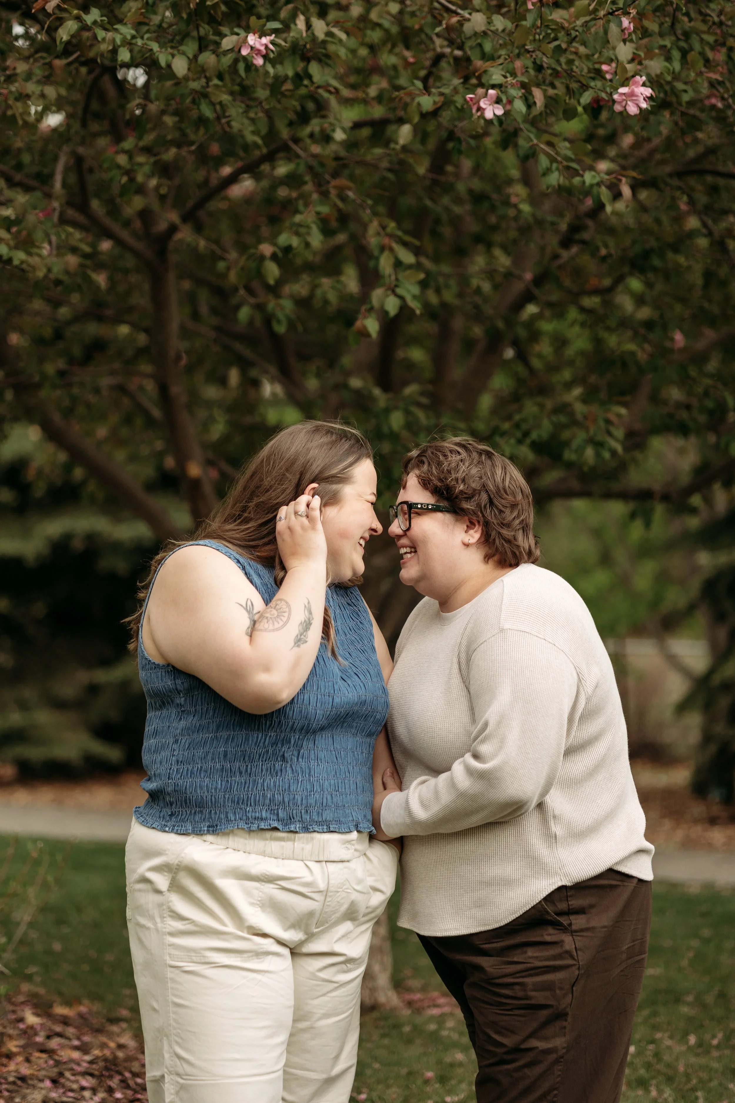 LGBTQIA+ couples session at the st. albert botanic park by queer friendly edmonton  wedding photographer tays photos and beauty 