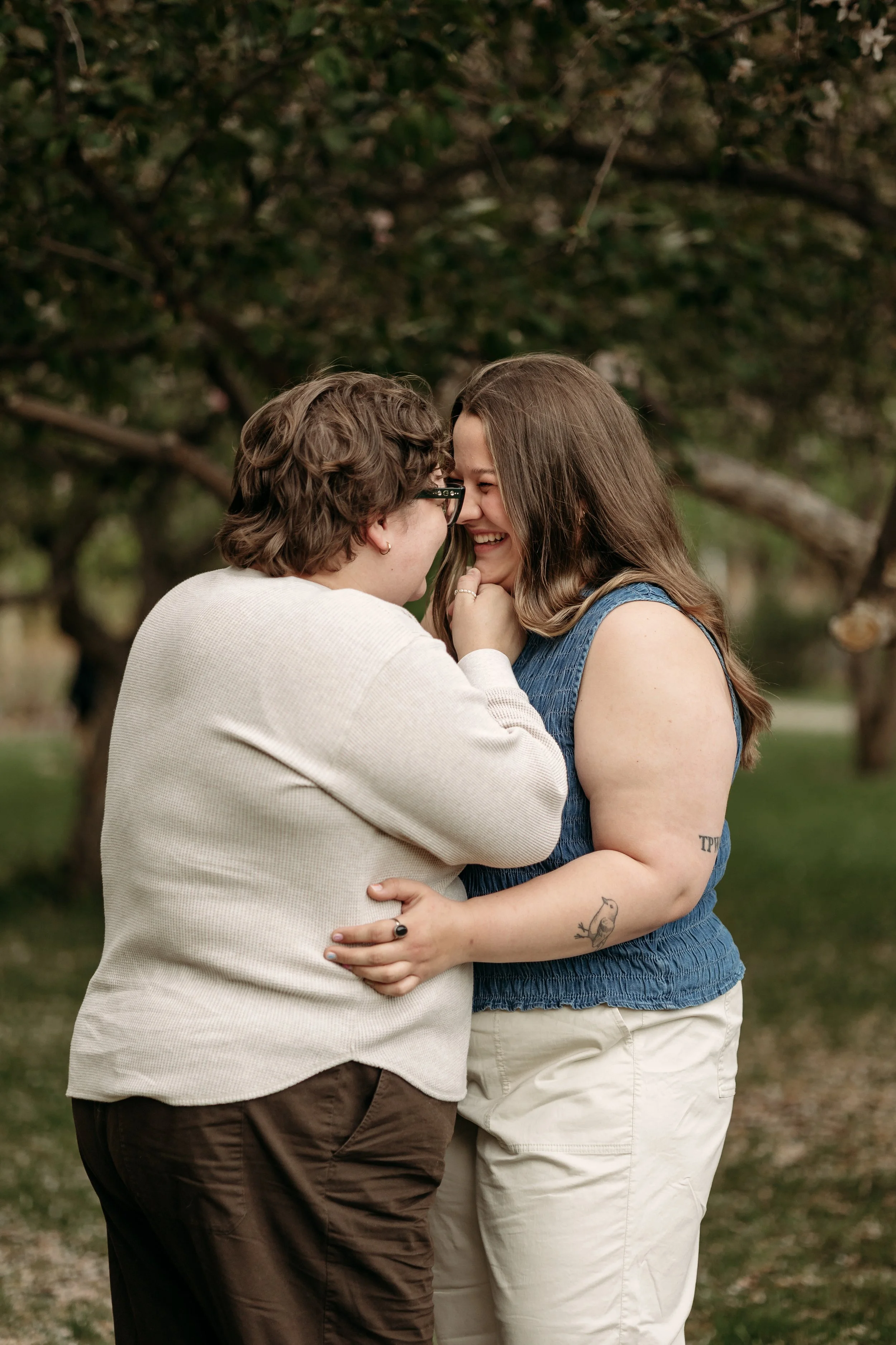 LGBTQIA+ couples photos at the st. albert botanic park by edmonton queer friendly wedding photographer tays photos and beauty 