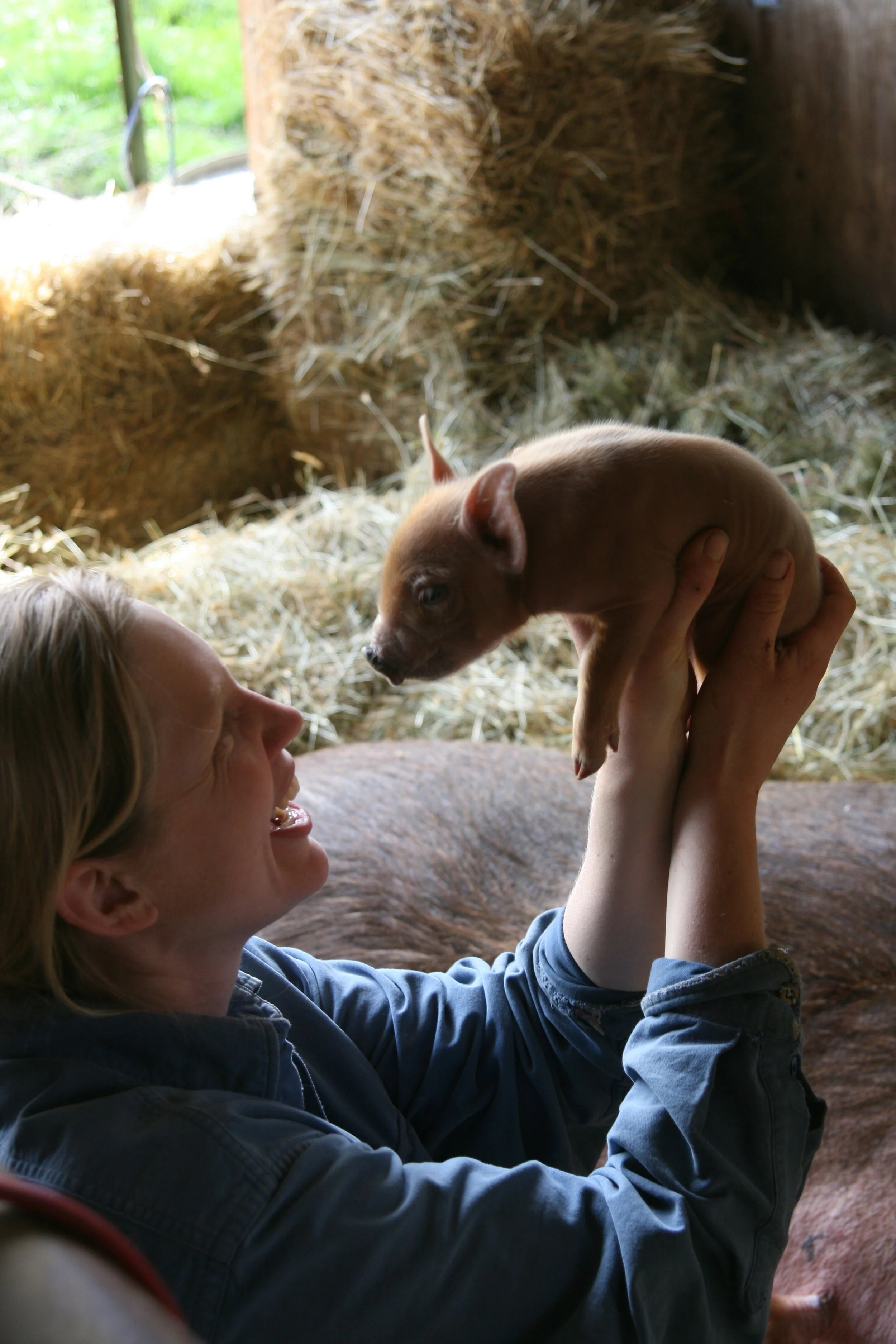 Flashback Photo: Spring, 2008 with Rosie’s newborn piglet
