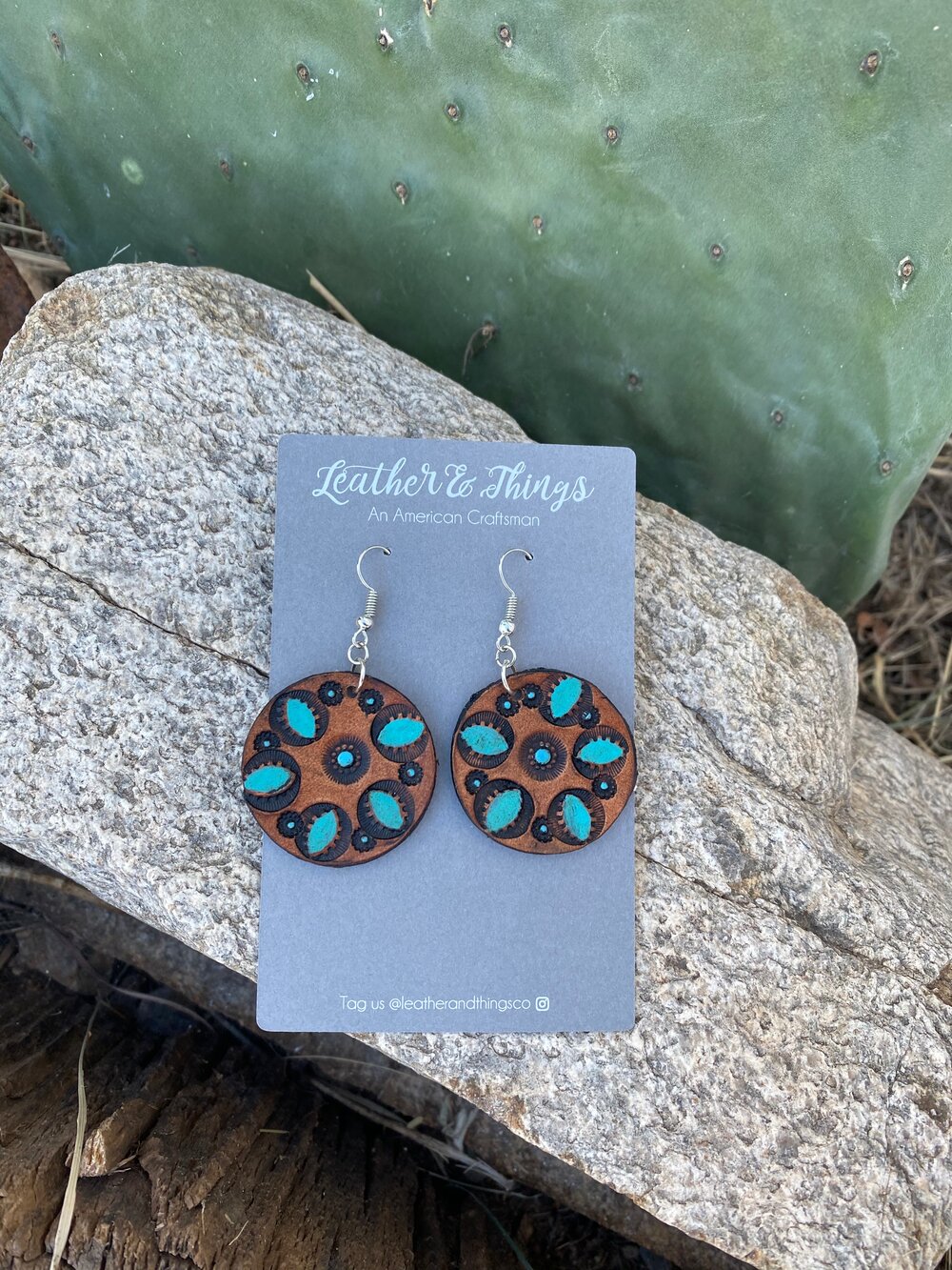 Round store leather earrings