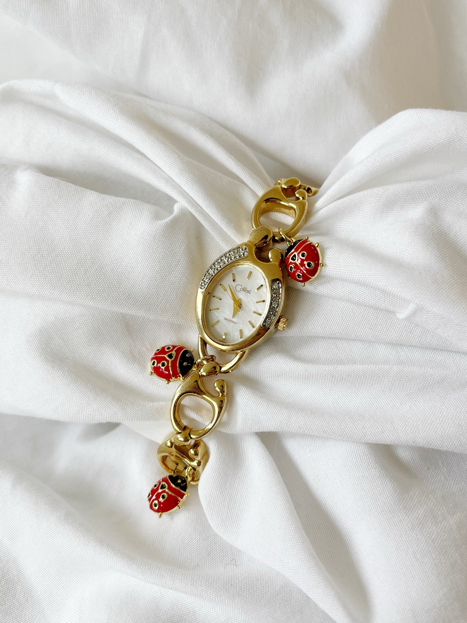 7-7.5” working ladybug charm watch
