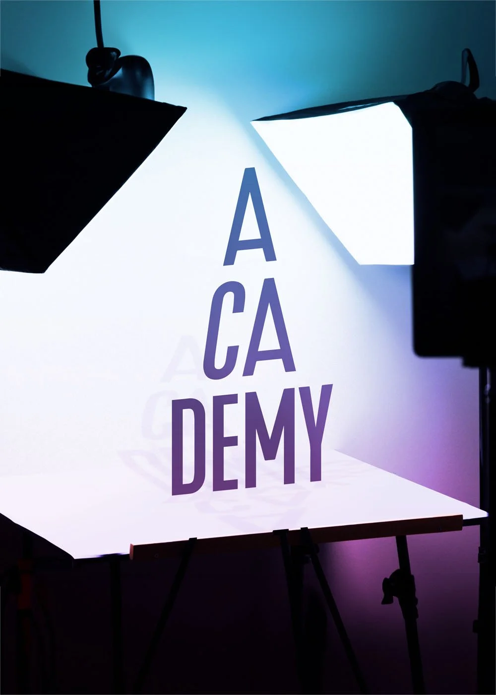 Lighting equipment illuminating a backdrop with the words "ACADEMY" printed on it in large letters.