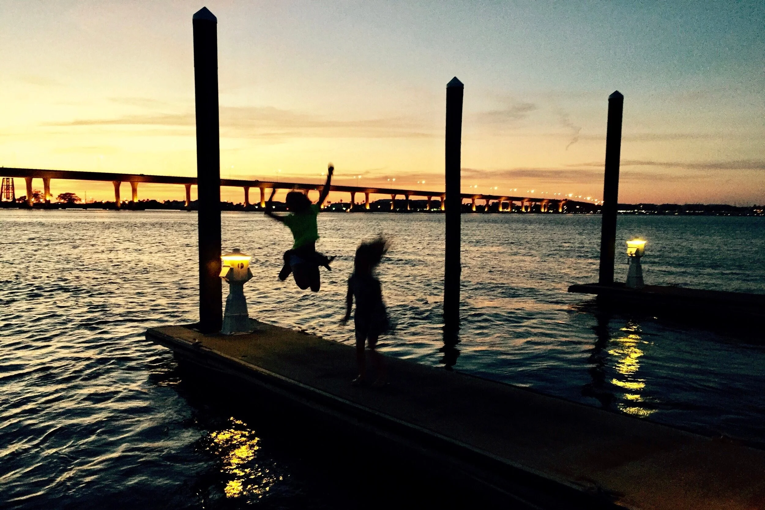 Z+Sophia+and+Lauren+jumping+on+the+dock.jpg